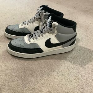 Grey, White and Black Nike High Tops.